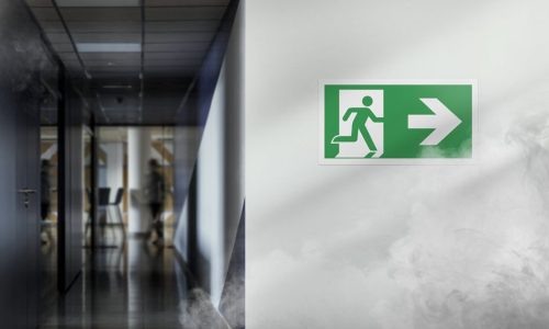 Image représentant la signalétique d'une issue de secours dans un erp